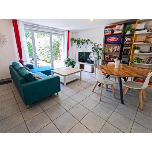 Duplex avec jardin au calme