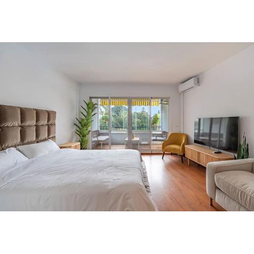 Elegant Studio with Balcony, Pool & Parking