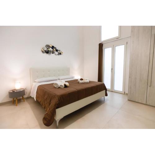 Elegante Bilocale con Giardino