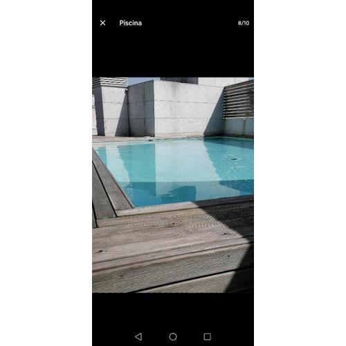 Estudio con piscina comunitaria