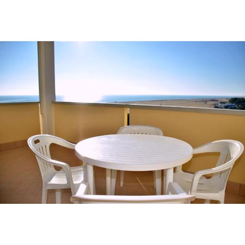 Experience the beach breeze in our bright flat