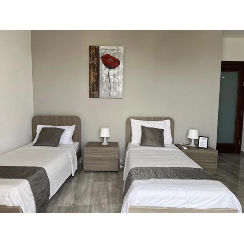 F10 Room 3, Private Room two single beds shared bathroom in shared Flat