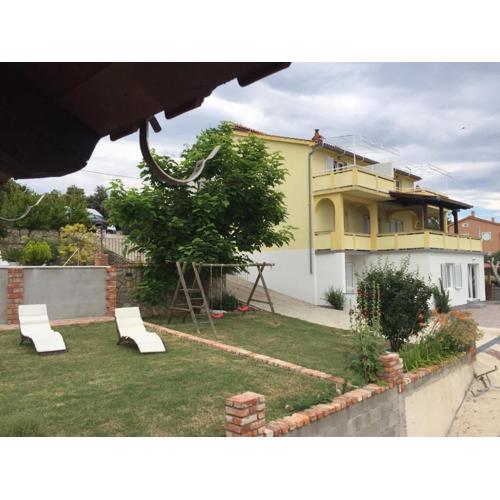Family friendly apartments with a swimming pool Palit, Rab - 16330