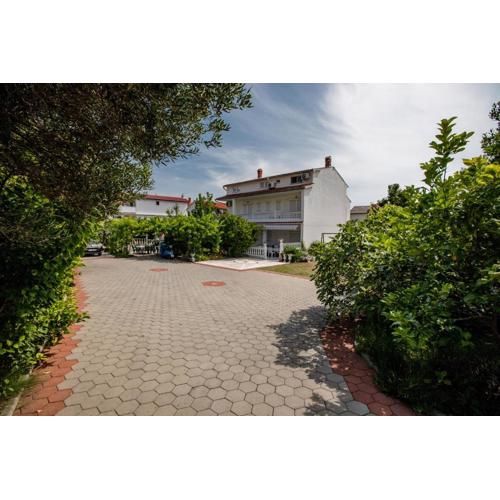 Family friendly apartments with a swimming pool Palit, Rab - 4990