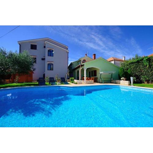 Family friendly apartments with a swimming pool Zadar - 23646
