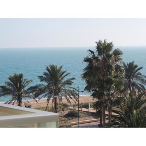 Frente a playa de arena