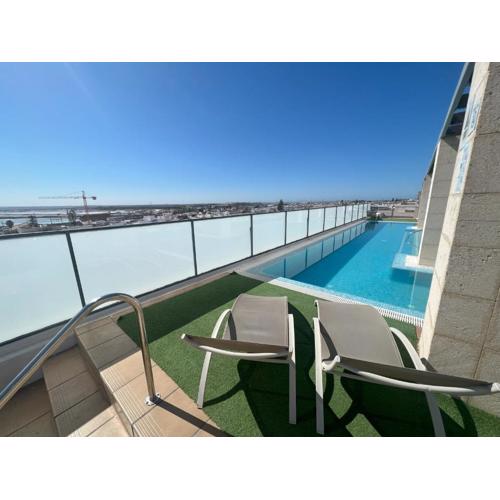 GATU PREMIUM Marismas, terraza, parking, piscina común y aire acc , \