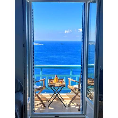 Grand Blue Balcony- Island House by Hostandros