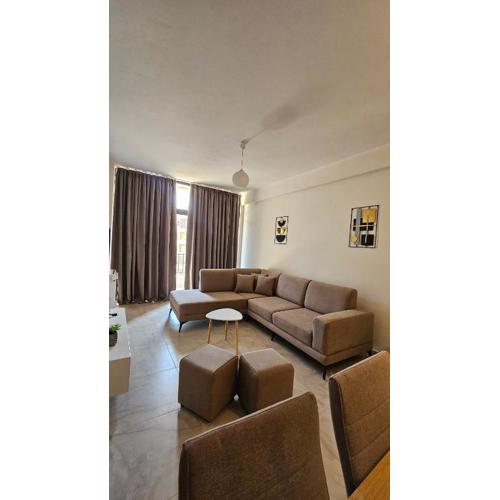 Gray Mirage Apartment near the beach