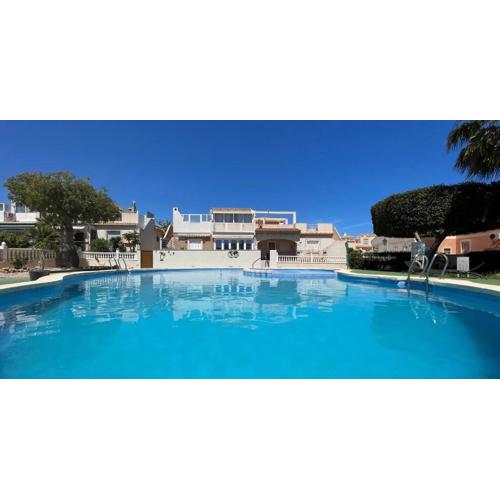 Holiday home with large roof terrace near La Mata beach