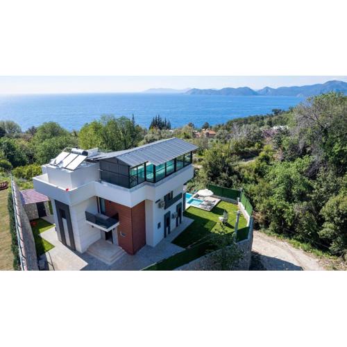 Holiday villa with sea view and heated pool Villa Mariposa
