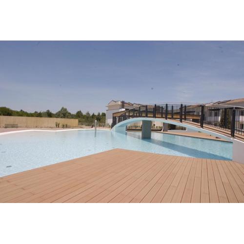 Homely flat with private garden and common pool