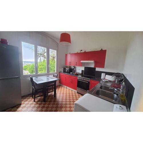 House with garden and view of Rouen