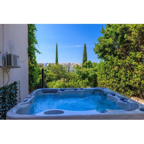 Idyllisches Apartment nur 300 Meter zum Strand mit Meerblick, Whirlpool, Grill