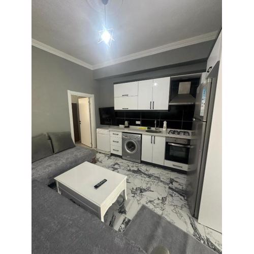 In the center, 6-7 minutes to the airport, close to the sea and coves
