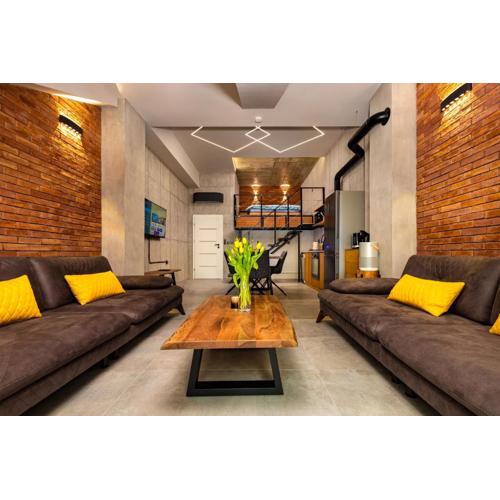 Industrial-style 2BD Loft with Parking Spot by Flat Mаnager