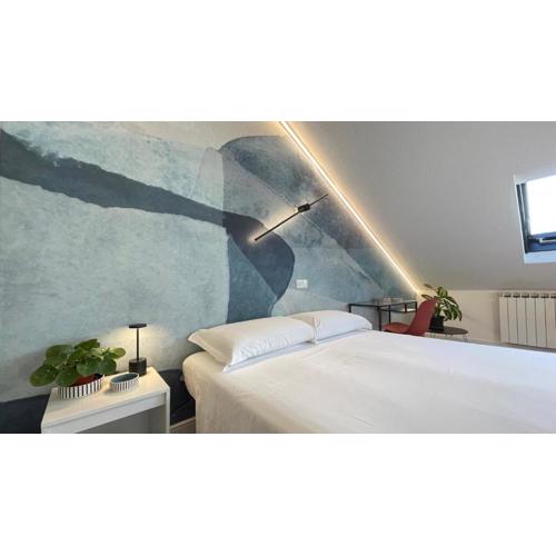 JOIVY Cosy Mansard Studios in Rapallo