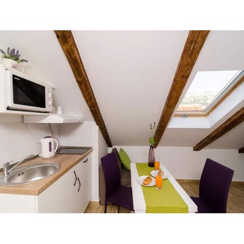Lavender Garden Apartments - Comfort Studio Apartment with Side Sea View Second Floor - APT 5