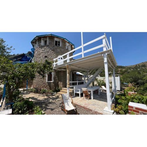 light house kule , değirmen deniz manzaralı taş villa