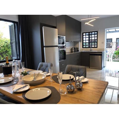 Luxurious 3-Bed Villa, Modern Decor, Communal Pool