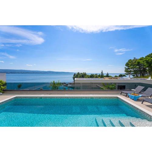Luxury, seafront Villa IVAN with heated pool only 100m from beach