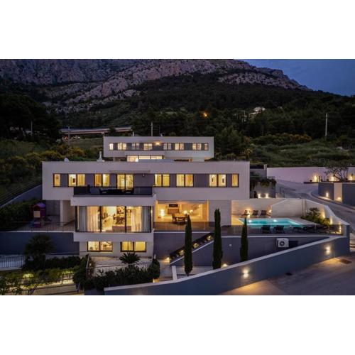 Luxury, seafront Villa Petra with heated pool only 50m from beach