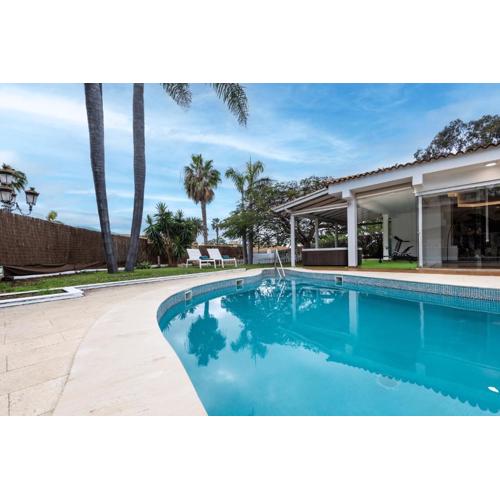 Luxury Villa with Heated Pool, Jacuzzi, Gym, and Gardens