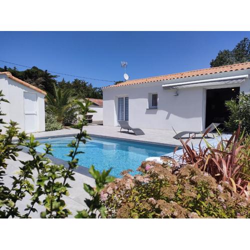Maison Neuve à Saint-Jean-de-Monts avec Piscine Chauffée, Jardin, et Proche Plage - FR-1-323-409