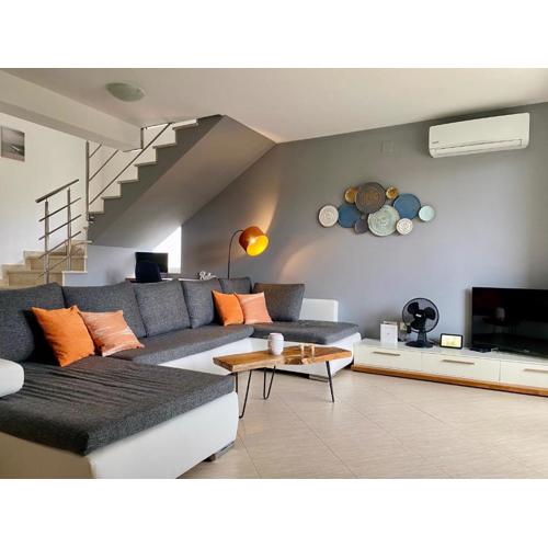 Modern and spacious 3-bedroom apartment with balcony & garden near beach