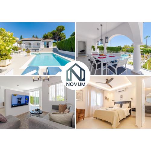 Modern villa with Heated Pool & BBQ Next to the Beach