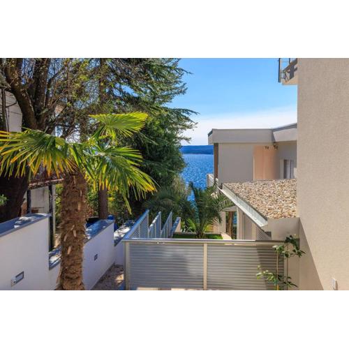 Modernes Apartment direkt am Strand mit Aussendusche, Meerblick, WiFi