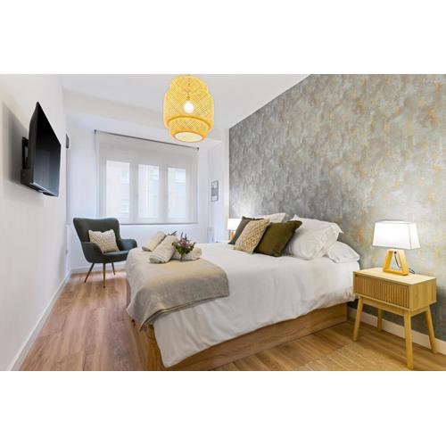 Monet, apartamento con terraza, cuna y trona