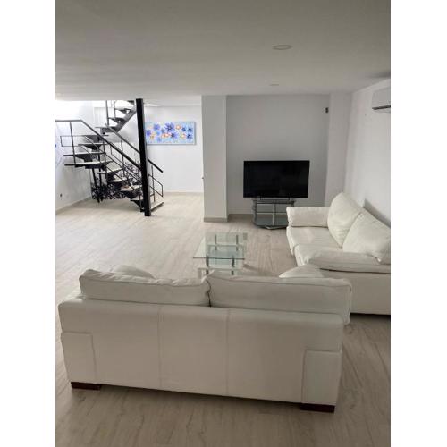 New - MiJa basement Loft Apartment steps from Beach - perfect for Sun and Sport Seekers