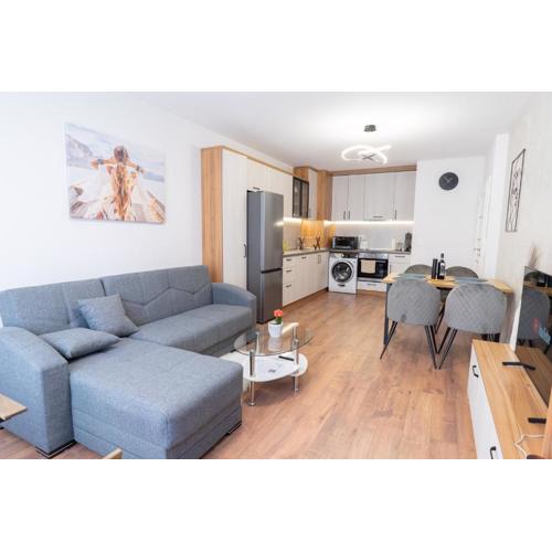 New Modern & Cozy apartment with FREE Private parking and EV charging station