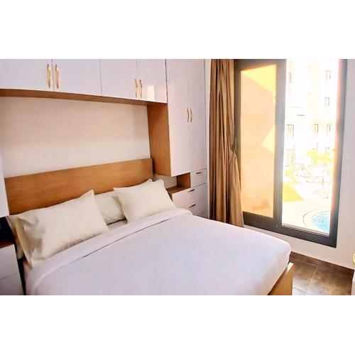 One bedroom apartment with a hall in Aqua Infinity Resort before El Gouna