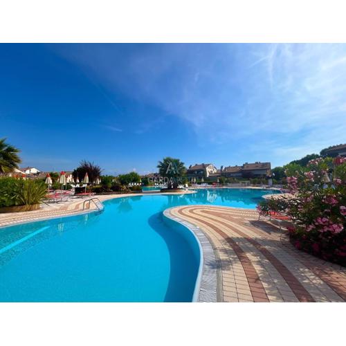 Orchidea Apt - 3 Piscine e un Bar a 200m dal Lago