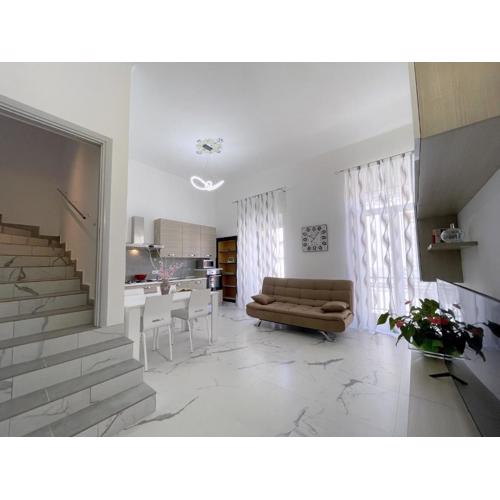 Palazzo degli Artigiani Appartamento con Terrazza e Comfort in Centro