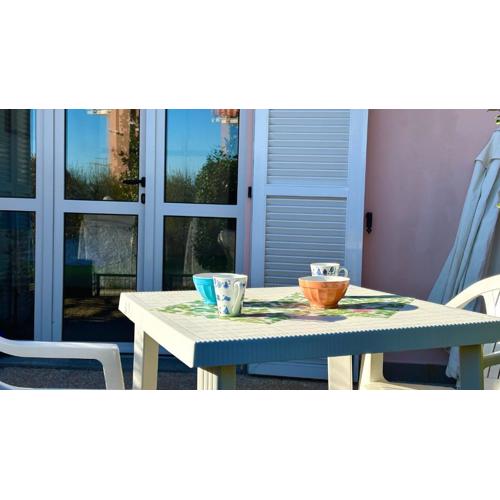 Palme 6 - Marcelli, bilocale con doppio giardino, Residence Le Palme