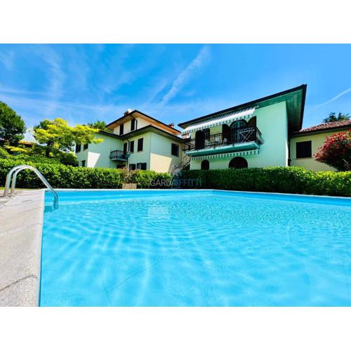 Parigi Apartment - 200m dal Lago con Vista piscina