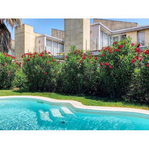 Pool facing apartment in LEscala