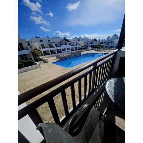 Pool view studio, shaded balcony