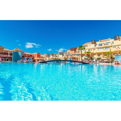 Prime Las Americas Getaway - Apartment with Huge Private Terrace & Pool Access