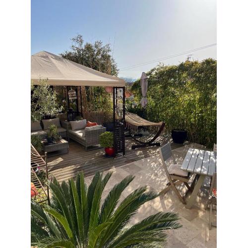RDC de maison avec terrasse barbecue