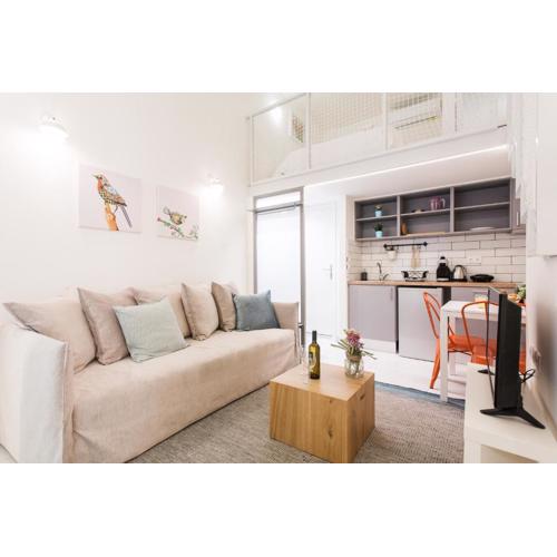 Relax in this funky loft next to metro!