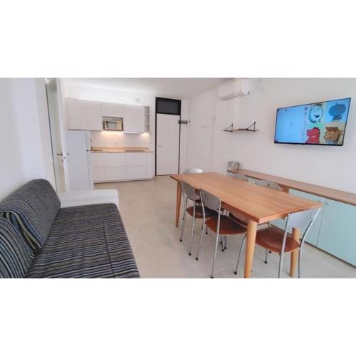 Relax on the terrace just 50 meters from the beach