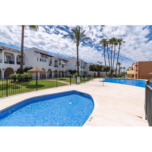 Renovated apartment on beachside with pool