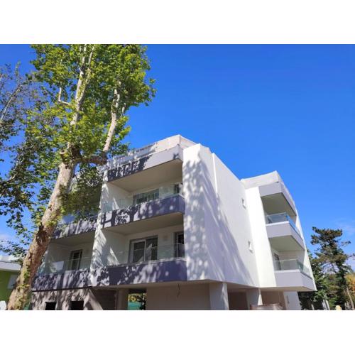 Renovated flat with private fenced garden in Bibione