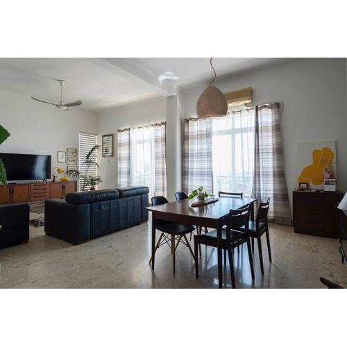 Room in a spacious modernist Apt with views & pool