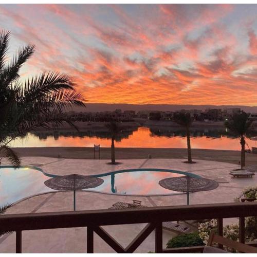 Sabina 1br apartment Lagoon view with shared pool By BFG Beit Fel Gouna
