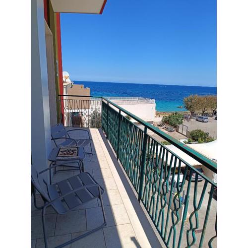 Sea side apartment with balcony and private park